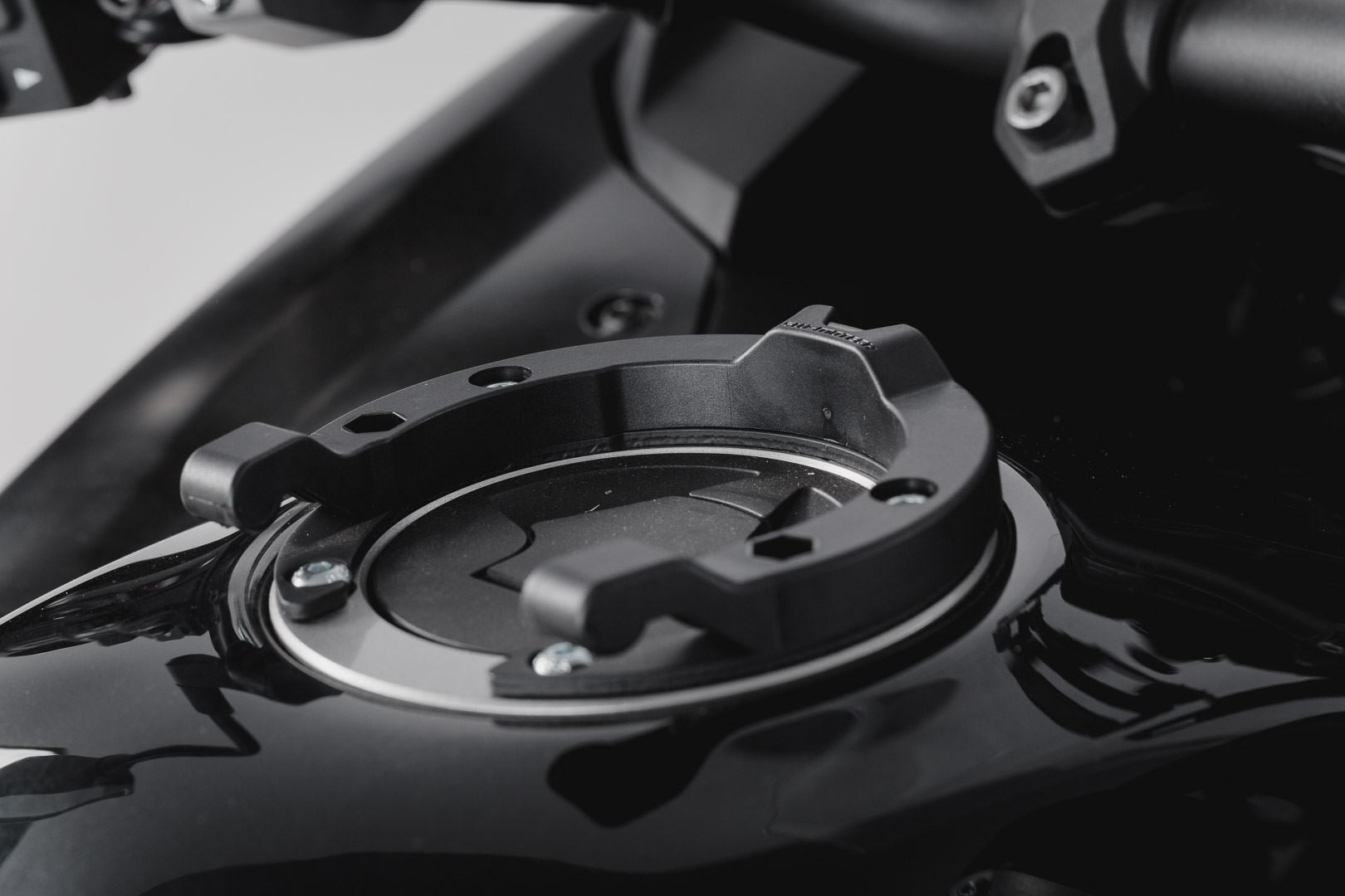 ION tank ring Black. 5 srews. Kawasaki models.