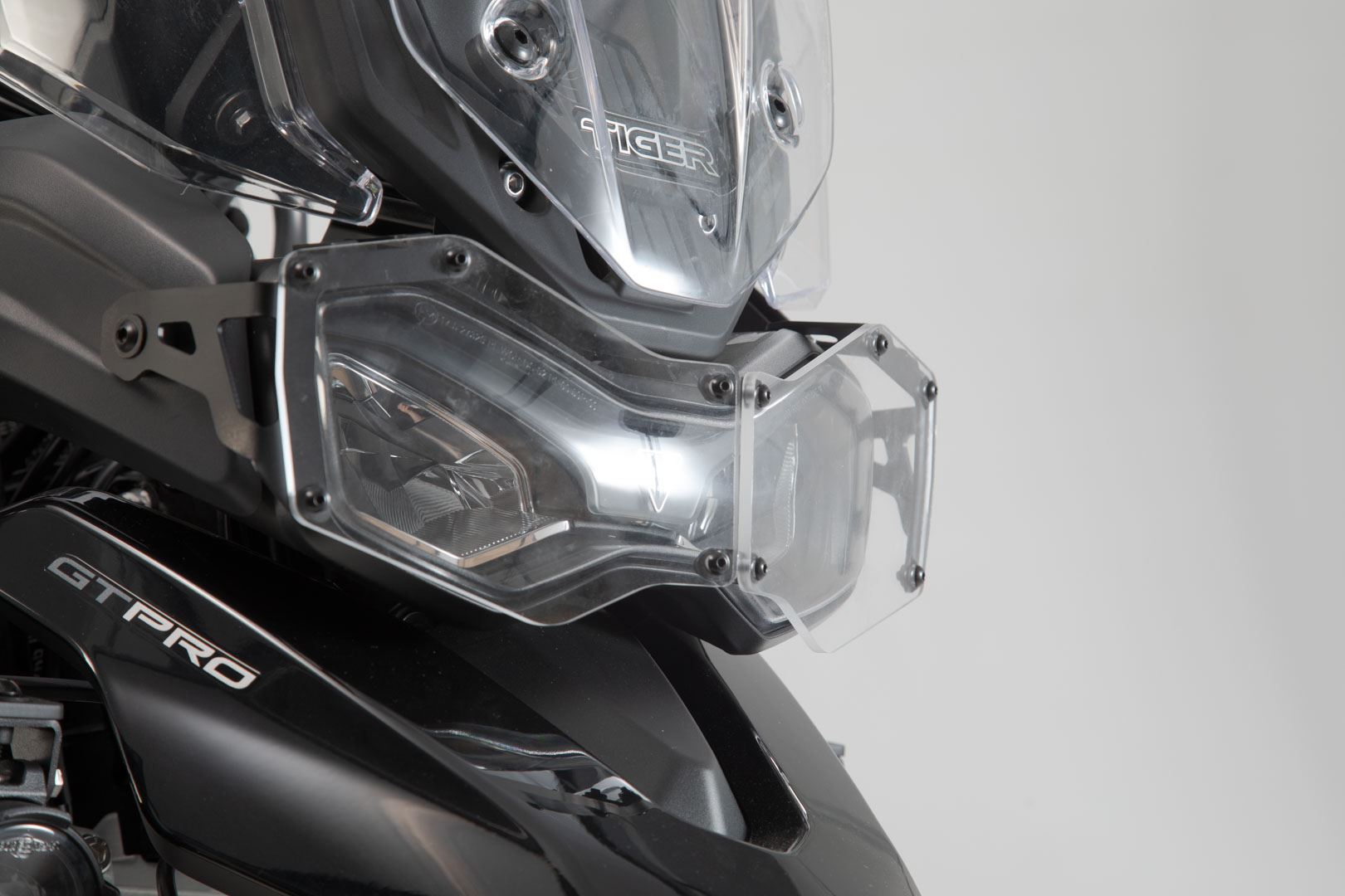 Headlight guard Bracket with cover. Tiger 900/ GT/ Rally/ Pro.